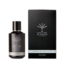 Black perfume bottle and packaging with brand logo on a white background
